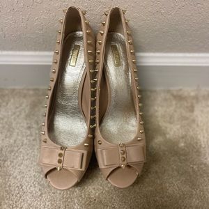 Platform heels, 5-6 inch heel. Gently used.